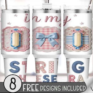 May include: White tumbler with a handle, featuring the text "in my spring era" in pink and blue stitched letters. The design includes a bow, a wrapped item, and stars. The bottom of the tumbler has the number "8" and the words "FREE DESIGNS INCLUDED".