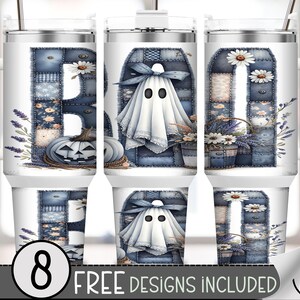 May include: White insulated tumbler featuring a patchwork design with the word "BOO" in blue denim-style letters. The design includes a ghost, a pumpkin, and floral accents. The bottom of the tumbler has the text "8 FREE DESIGNS INCLUDED".