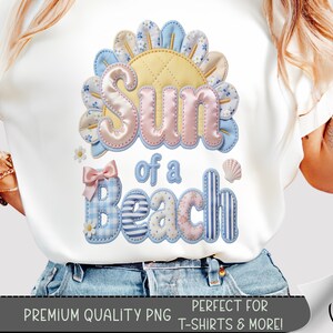 May include: White t-shirt featuring a colorful graphic design. The design includes the words "Sun of a Beach" in pastel colors, a sun, a bow, and a seashell. The text "PREMIUM QUALITY PNG" and "PERFECT FOR T-SHIRTS & MORE!" are also visible.