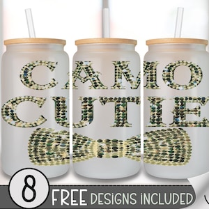 May include: Three frosted glass tumblers with wooden lids and straws. The words "CAMO CUTIE" are displayed in a camouflage pattern, along with a camouflage bow tie. The bottom of the image reads "8 FREE DESIGNS INCLUDED".