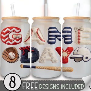 May include: Three frosted glass tumblers with wooden lids and straws. Each tumbler has a baseball-themed design spelling "GAME DAY". Designs include a baseball glove, baseball, and baseball bat. The image also includes the text "8 FREE DESIGNS INCLUDED".