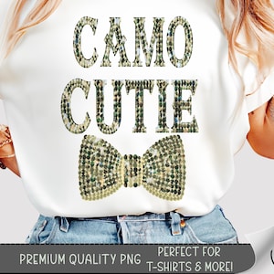 May include: White t-shirt with the text "CAMO CUTIE" in a camouflage pattern, and a matching bow tie design. The bottom of the image includes the text "PREMIUM QUALITY PNG" and "PERFECT FOR T-SHIRTS & MORE!"