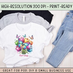 May include: White t-shirt with a colorful butterfly and flower design. The design features a bouquet of tulips with butterflies and the word "Spring" printed below.