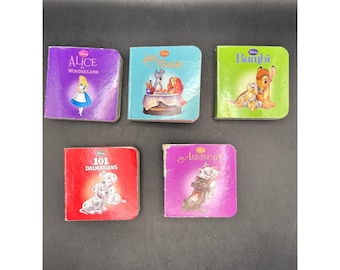 May include: Five small Disney board books featuring Alice in Wonderland, Lady and the Tramp, Bambi, 101 Dalmatians, and The Aristocats. Each book has a colorful cover with character illustrations and the respective movie title printed on the front.