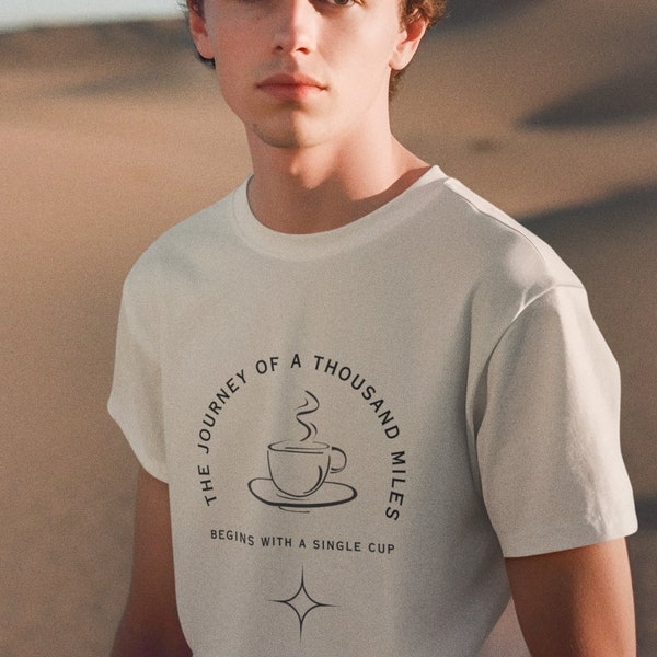 Coffee-Themed T-Shirt "The Journey of 1,000 Miles Begins with a Single Cup"