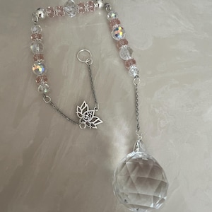 Celebrate October&#39;s birthstone with this Suncatcher.  Beautiful Pink Tourmaline crystal beads sparkle when the sun hits them.  Great Gift.