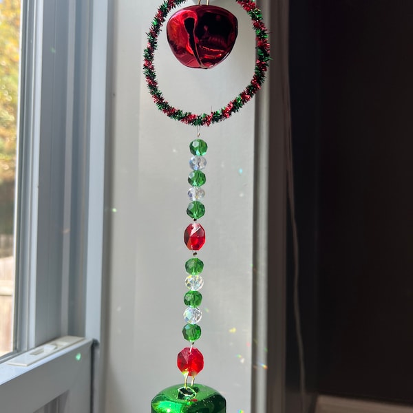 Christmas themed suncatcher.  Red, green and clear crystal beads sparkle in the sun.  Makes a great gift for any occasion.