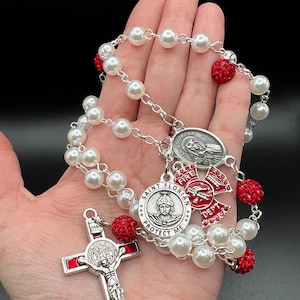Fire Department St Florian. Crucified Jesus Centerpiece. European Glass Pearl Rosary in White and Red Paters. Blessed by Catholic Priest.