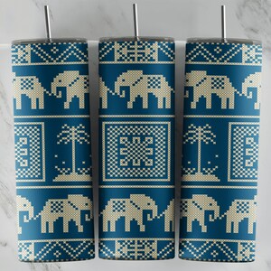 May include: Three blue and cream patterned stainless steel tumblers with a design of elephants, palm trees, and geometric shapes.