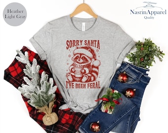 Feral Raccoon Christmas Shirt: Funny Santa Apology Tee