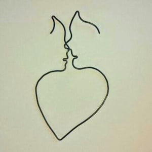 Couple face, minimalist decoration, wire wall decoration, minimalist wall decoration, hanging wall decoration.