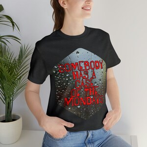 Somebody Has a Case of the Mondays Unisex Jersey Short Sleeve Tee