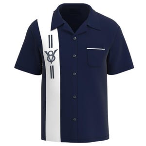May include: Navy blue short-sleeve shirt with a white vertical stripe down the front. The stripe features a stylized emblem and two vertical lines. The shirt has a pocket and a white trim on the pocket.