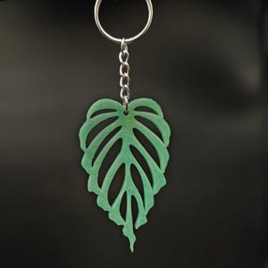 Burle Marx Flame Monstera keychain color changing from green to yellow or purple to pink