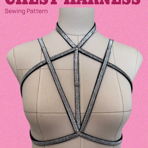 May include: A chest harness sewing pattern displayed on a mannequin. The harness is black with silver glitter trim and features a halter neck and crisscross design. The text "CHEST HARNESS" and "Sewing Pattern" are at the top. Sizes available: XXS - XXXL.