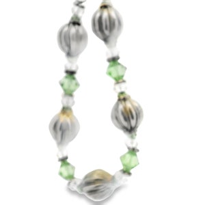 Handmade made, green crystal and Sterling Silver bracelet and earring set.  Bracelet,.  Earring length 2  1/4&quot;&#39; Including ear wire;