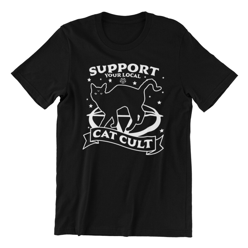 May include: Black t-shirt with a white graphic of a cat with the text "Support Your Local Cat Cult".