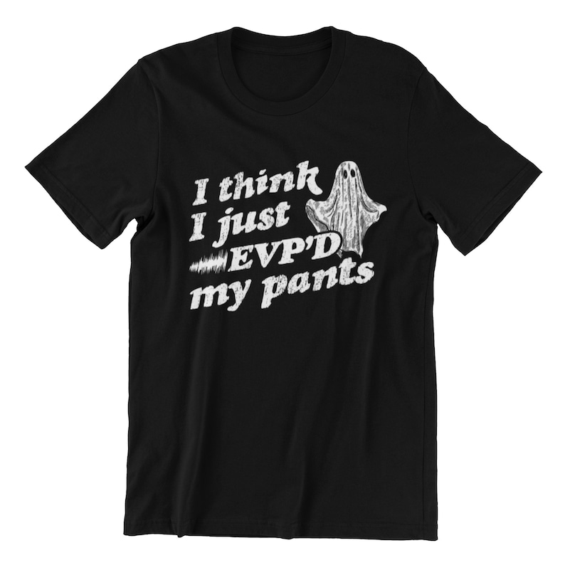 May include: Black t-shirt with a white ghost graphic and the text "I think I just EVP'D my pants".