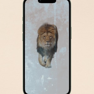 May include: A digital art print of a lion on a smartphone screen. The lion is depicted with a brown mane and a focused expression, set against a textured, light gray background. The phone has a green frame.