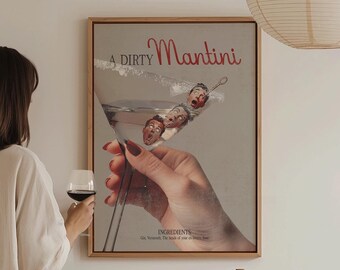 Może przedstawiać: Ramka z plakatem z tekstem "A Dirty Martini" i ilustracją kieliszka do martini z oliwkami. Kieliszek jest trzymany przez dłoń z czerwonym lakierem do paznokci. Plakat wisi na białej ścianie.