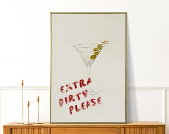 May include: A white canvas print with a red and white illustration of a martini glass with olives and the text "Extra Dirty Please".