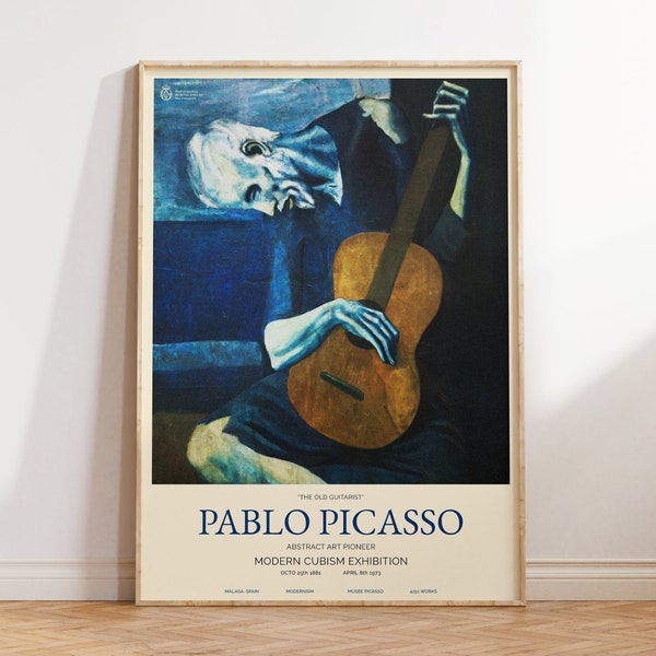 May include: Framed poster of Pablo Picasso's "The Old Guitarist" in shades of blue and brown. The artwork depicts a seated figure playing a guitar. The poster includes text about the Modern Cubism Exhibition.