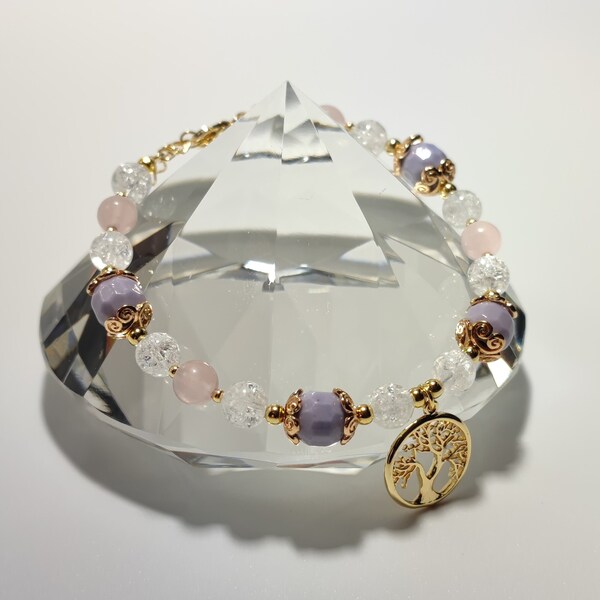 Bracelet Cristal de Roche Crack (A) de 6mm, Quartz rose (A) de 6mm, perles Céramiques mauve de 10mm, breloque arbre de vie dorée or fin.