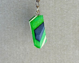 Polygonal Keychain made of recycled skateboards
