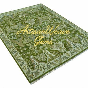 May include: A green rug with a floral pattern and a gold inscription that reads "Artisan Weave Gems".