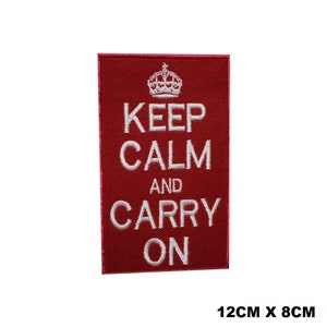 May include: Red embroidered iron-on patch with a white crown and the text "Keep Calm and Carry On". The patch measures 12 inches by 8 inches.