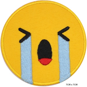 May include: Yellow embroidered iron-on patch with a crying face emoji. The face is yellow with a red mouth and black eyes. Two blue teardrop shapes are coming from the eyes.