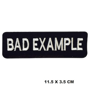 Mal ejemplo palabra lema logotipo hierro/coser en parche bordado apliques para ropa