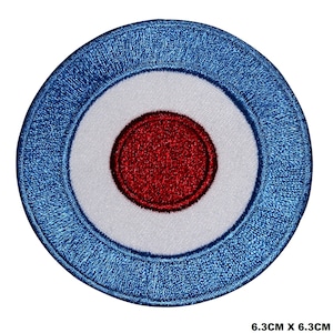 May include: A blue, white, and red embroidered target patch. The patch is 6.3 inches in diameter.