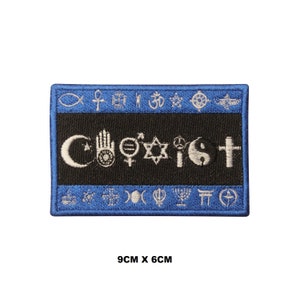 May include: A blue and black embroidered patch with the word "Coexist" in white lettering surrounded by various religious symbols. The patch is 9 cm by 6 cm.