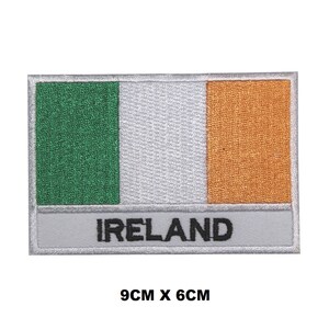 May include: An embroidered iron-on patch featuring the Irish flag with the word "IRELAND" below. The patch is 9 cm by 6 cm.