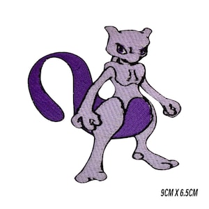 May include: Embroidered patch featuring a purple Mewtwo character from the Pokémon series. The patch is light purple with darker purple accents and a curved tail. The patch measures 9cm x 6.5cm.