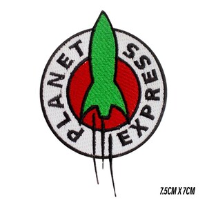 May include: Embroidered patch featuring the Planet Express logo from Futurama. The design includes a green rocket ship inside a red circle, surrounded by a white border with the words "PLANET EXPRESS" in black. The patch measures 7.5cm x 7cm.