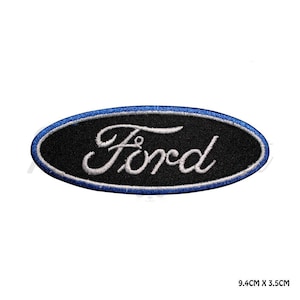 May include: An embroidered Ford logo patch. The oval patch has a black background with the word "Ford" in white script. A blue border surrounds the oval. The patch measures 9.4cm x 3.5cm.