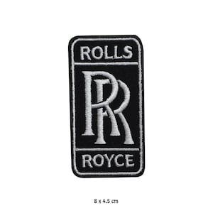 Peut inclure: Écusson brodé noir et blanc avec le logo Rolls Royce. Le patch rectangulaire présente les mots "ROLLS" et "ROYCE" en blanc, avec l'emblème emblématique du double "R". Dimensions : 8 x 4,5 cm.