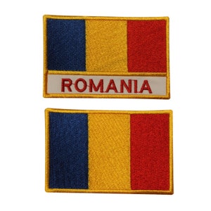 May include: Two embroidered patches featuring the Romanian flag. The top patch has the flag with the word "ROMANIA" below it. The bottom patch is just the flag.