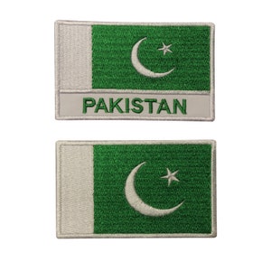 May include: Two embroidered patches featuring the flag of Pakistan. The patches are rectangular and have a white background with a green crescent moon and a white star. The word "PAKISTAN" is written in white letters on a gray background below the flag.