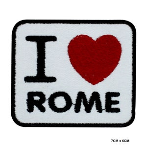 May include: White square patch with black embroidered text "I love Rome" and a red heart.