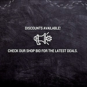 May include: Blackboard with white chalk writing that says "Discounts Available!" with a white outline of a megaphone with a starburst and a percent sign inside. Below the megaphone is the text "Check our shop bio for the latest deals."