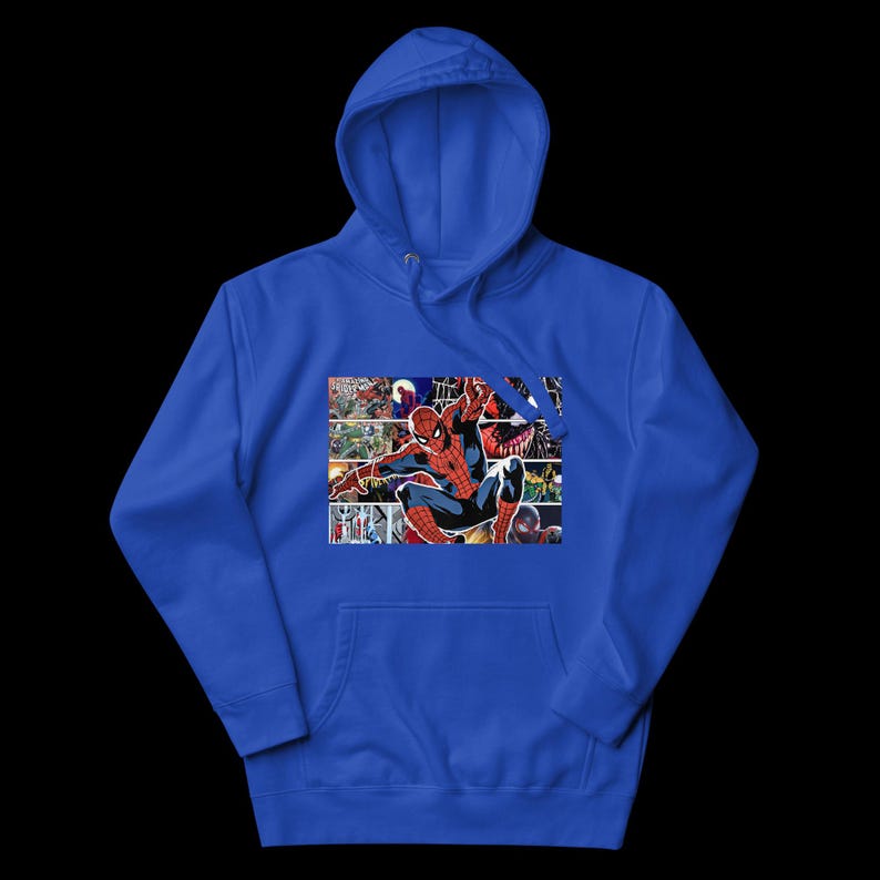 May include: Royal blue hoodie with a Spider-Man comic book graphic. The graphic shows Spider-Man in action, set against a collage of comic book panels. The hoodie has a drawstring hood and a front pocket.