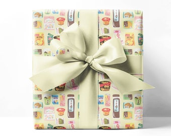 Papel de regalo con diseño de snacks japoneses: estampado de máquina expendedora kawaii.