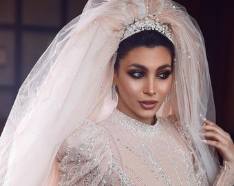 Fluffy bridal veil with crystals and pearls from three tiers of soft tulle with a comb for attaching to hair, veil royal and UK style