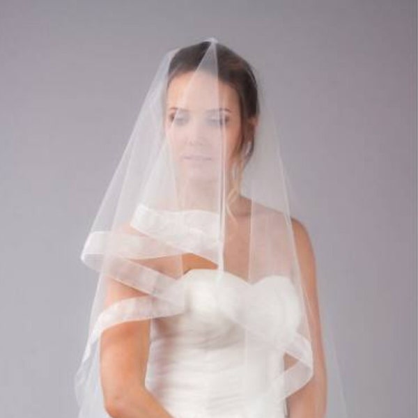 Wide by a 3" horsehair edge veil soft tulle 2 tiers with comb