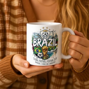 May include: A set of three ceramic nesting bowls in shades of blue, green, and white. The bowls feature a speckled glaze and a simple, modern design. The largest bowl is approximately 7 inches in diameter.