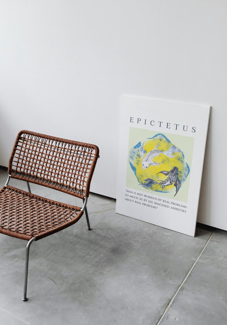 May include: A white poster with the text "EPICTETUS" and a quote by Epictetus: "Man is not worried by real problems so much as by his imagined anxieties about real problems". The poster features a watercolor painting of two fish swimming in a yellow and blue circle.