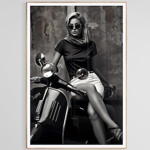 Black and White 1980s Fashion Model on a Vespa Scooter, Fashion model strikes a captivating pose on a classic Vespa Scooter.